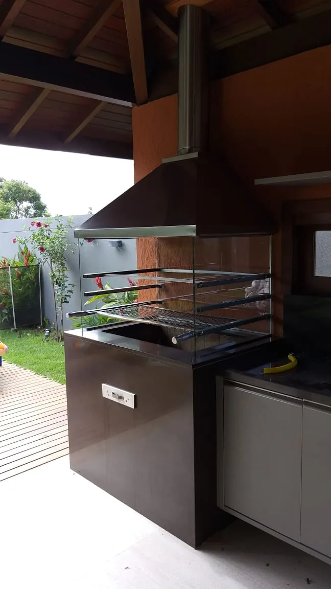Área gourmet finalizada com churrasqueira integrada